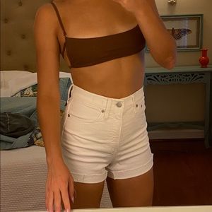 Tags on Madewell white high wasted denim shorts
